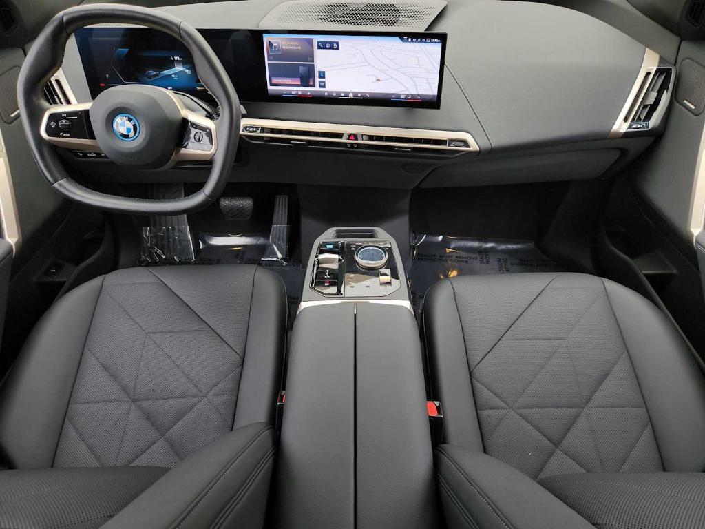 used 2024 BMW iX car, priced at $55,990