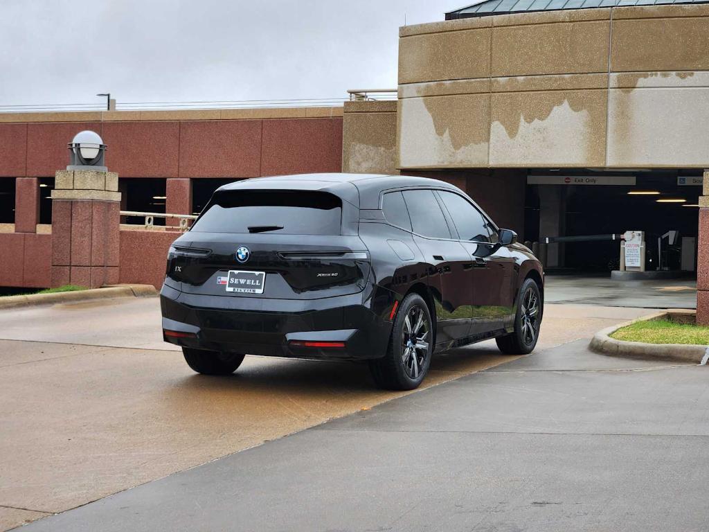 used 2024 BMW iX car, priced at $55,990