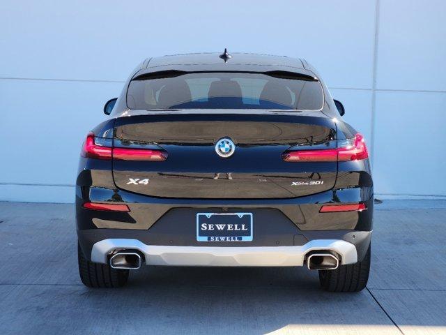 used 2024 BMW X4 car, priced at $51,990