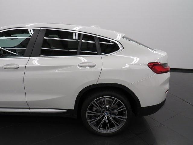 used 2023 BMW X4 car, priced at $45,419