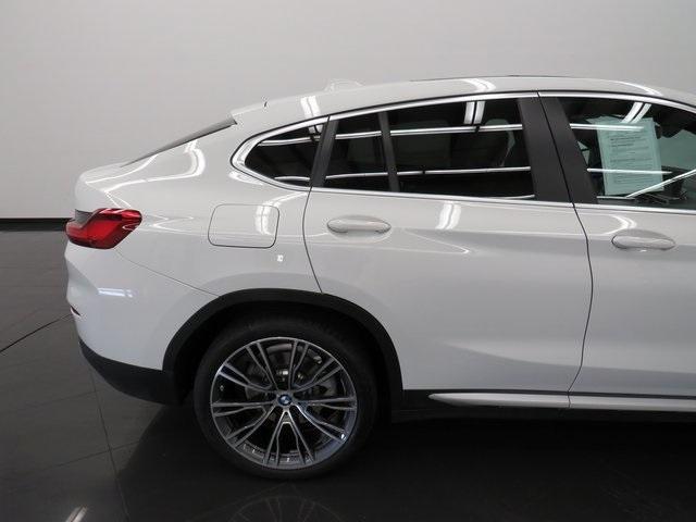 used 2023 BMW X4 car, priced at $45,419