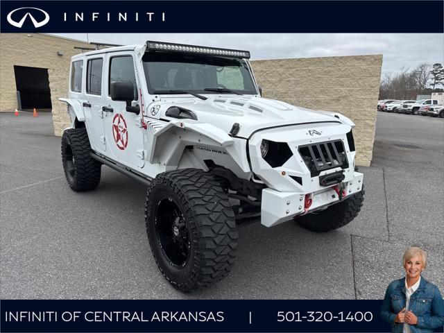 used 2018 Jeep Wrangler JK Unlimited car, priced at $26,975