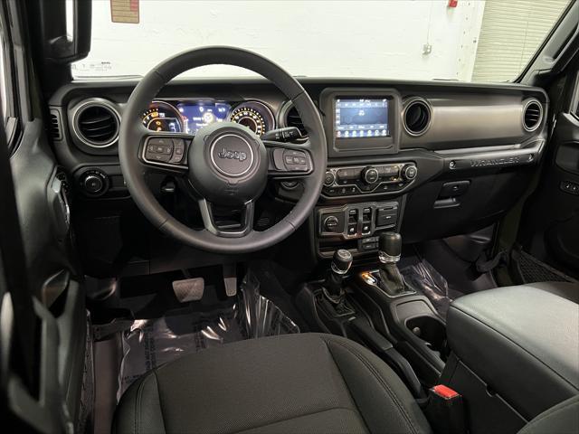 used 2023 Jeep Wrangler car, priced at $33,393