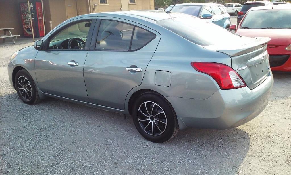 used 2014 Nissan Versa car, priced at $3,488