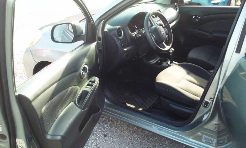 used 2014 Nissan Versa car, priced at $3,488