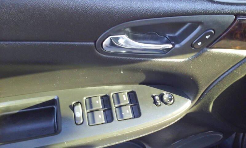 used 2013 Chevrolet Impala car, priced at $1,988