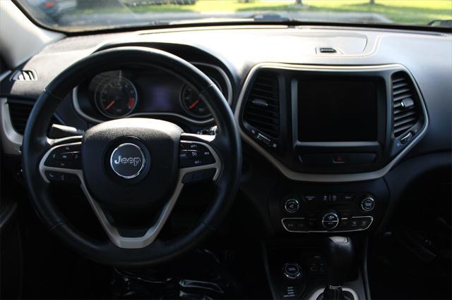used 2015 Jeep Cherokee car, priced at $13,990