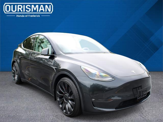used 2024 Tesla Model Y car, priced at $34,490