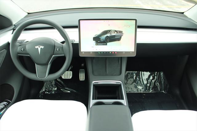 used 2024 Tesla Model Y car, priced at $34,490