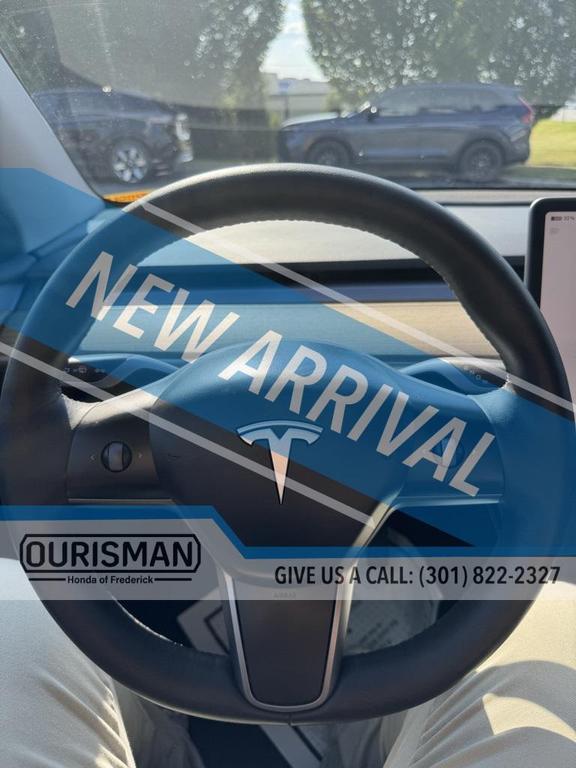 used 2023 Tesla Model Y car, priced at $30,690