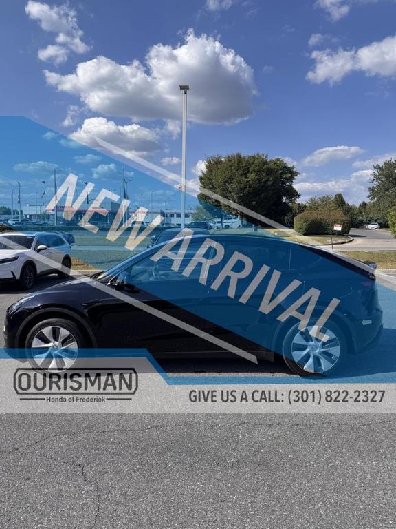 used 2023 Tesla Model Y car, priced at $30,690