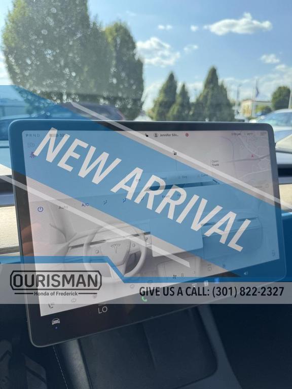 used 2023 Tesla Model Y car, priced at $30,690