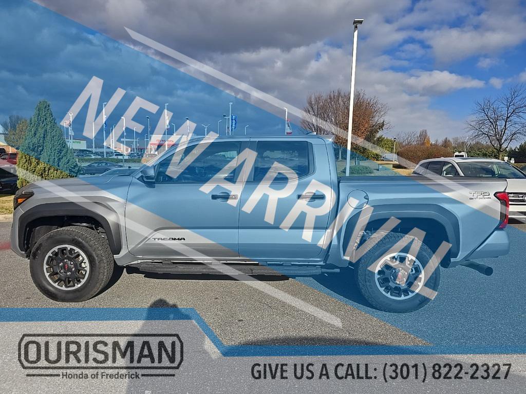 used 2024 Toyota Tacoma car, priced at $40,990