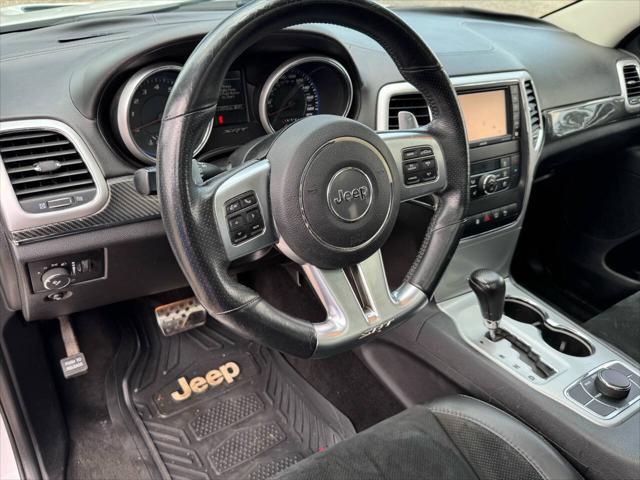 used 2013 Jeep Grand Cherokee car, priced at $27,000