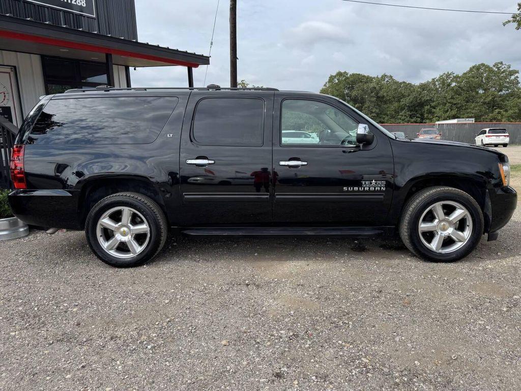 used 2013 Chevrolet Suburban car, priced at $14,000