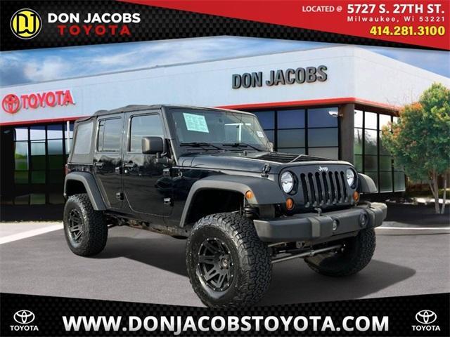 used 2011 Jeep Wrangler Unlimited car, priced at $12,250