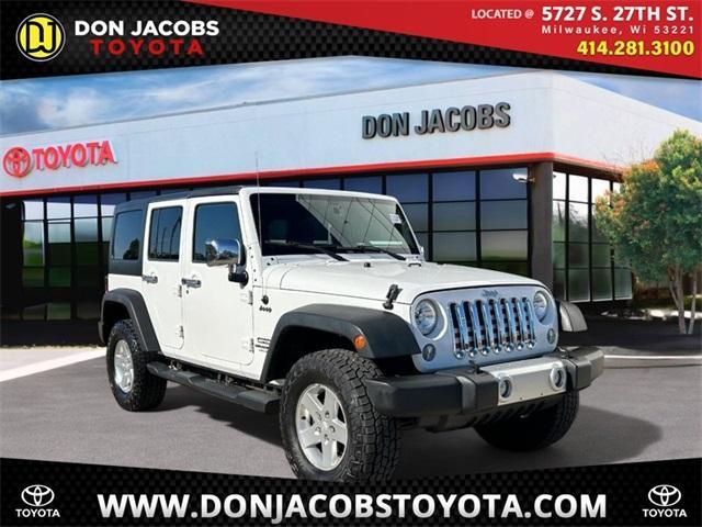 used 2014 Jeep Wrangler Unlimited car, priced at $17,250
