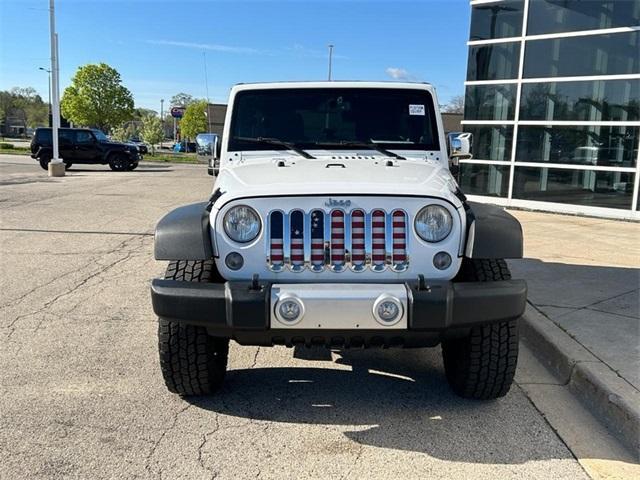 used 2014 Jeep Wrangler Unlimited car, priced at $17,320