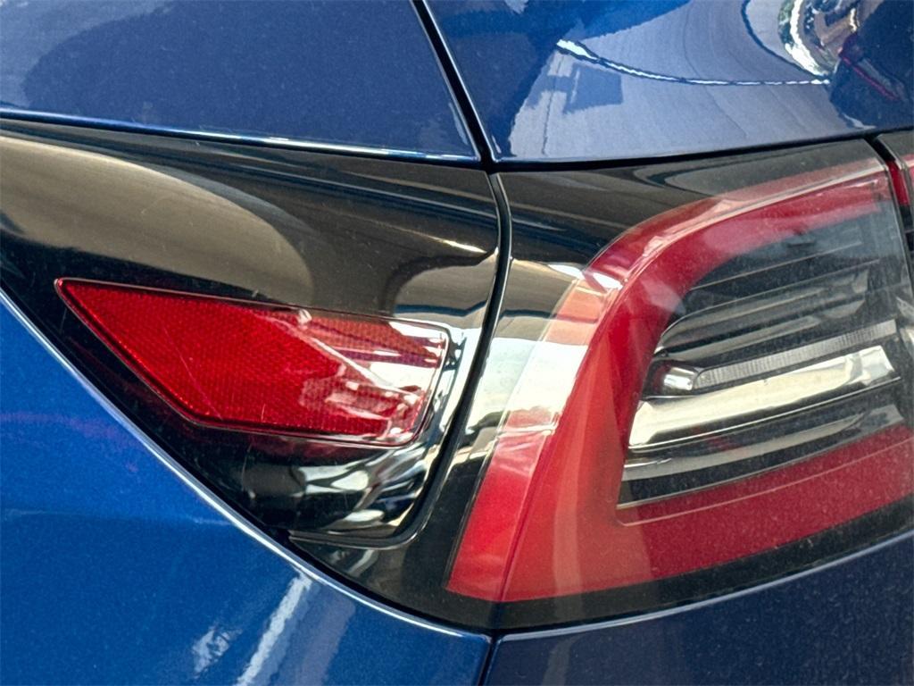 used 2024 Tesla Model Y car, priced at $35,618