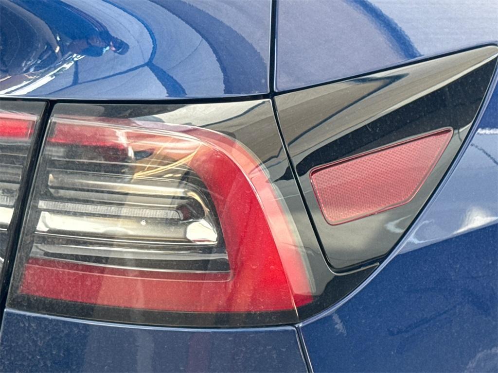 used 2024 Tesla Model Y car, priced at $35,618