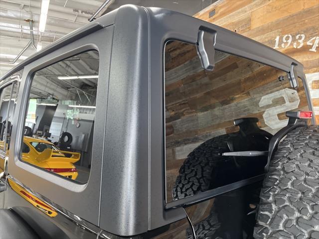 used 2021 Jeep Wrangler Unlimited car, priced at $39,376