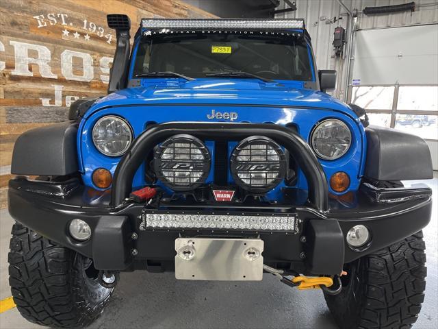 used 2011 Jeep Wrangler Unlimited car, priced at $33,300