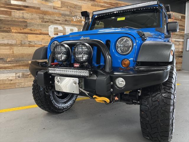 used 2011 Jeep Wrangler Unlimited car, priced at $33,300