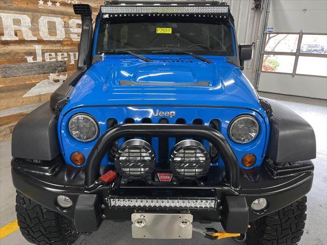 used 2011 Jeep Wrangler Unlimited car, priced at $33,300