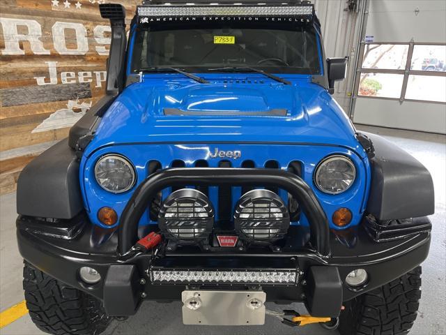 used 2011 Jeep Wrangler Unlimited car, priced at $33,300