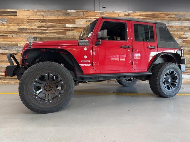 used 2012 Jeep Wrangler Unlimited car, priced at $13,100