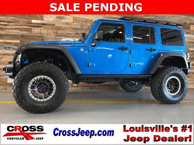 used 2015 Jeep Wrangler Unlimited car, priced at $34,600