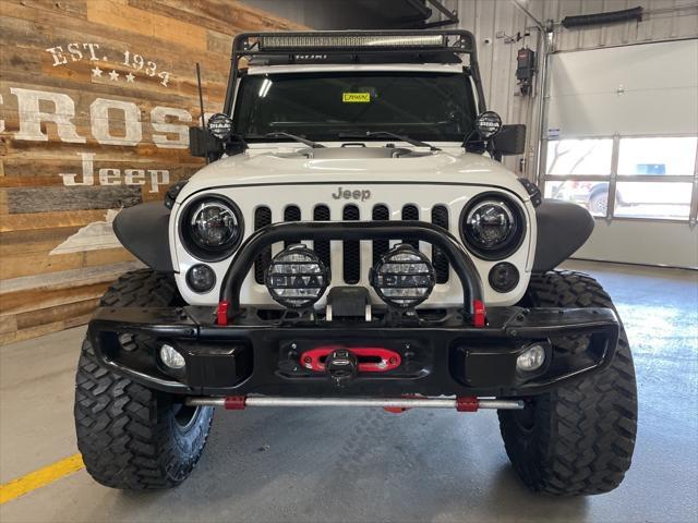 used 2015 Jeep Wrangler Unlimited car, priced at $27,780