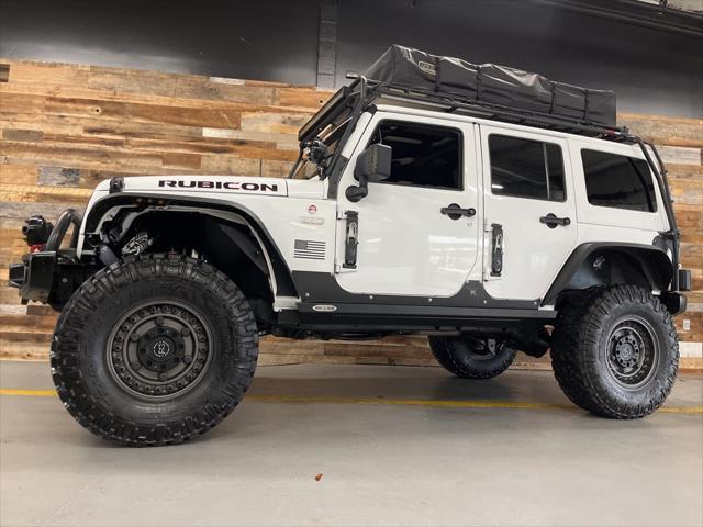 used 2015 Jeep Wrangler Unlimited car, priced at $29,106