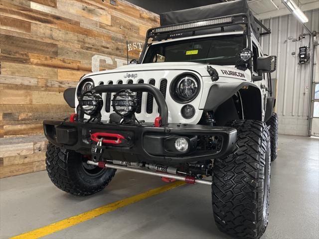 used 2015 Jeep Wrangler Unlimited car, priced at $29,106