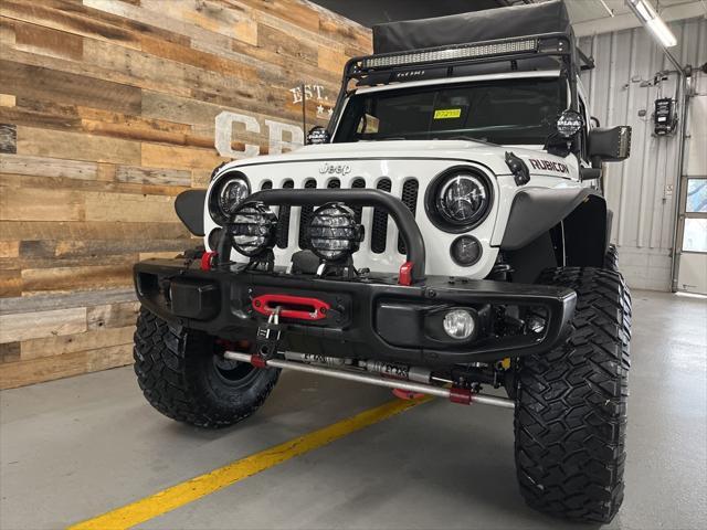 used 2015 Jeep Wrangler Unlimited car, priced at $29,106