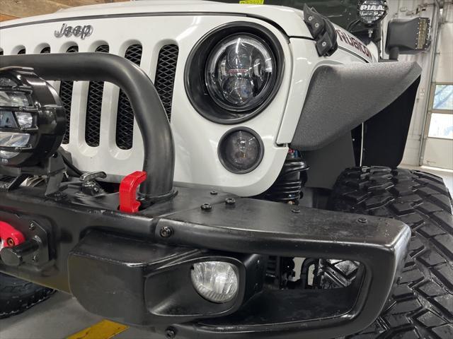 used 2015 Jeep Wrangler Unlimited car, priced at $29,106