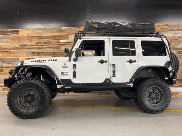 used 2015 Jeep Wrangler Unlimited car, priced at $29,106