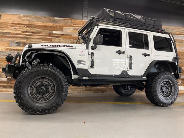 used 2015 Jeep Wrangler Unlimited car, priced at $29,106