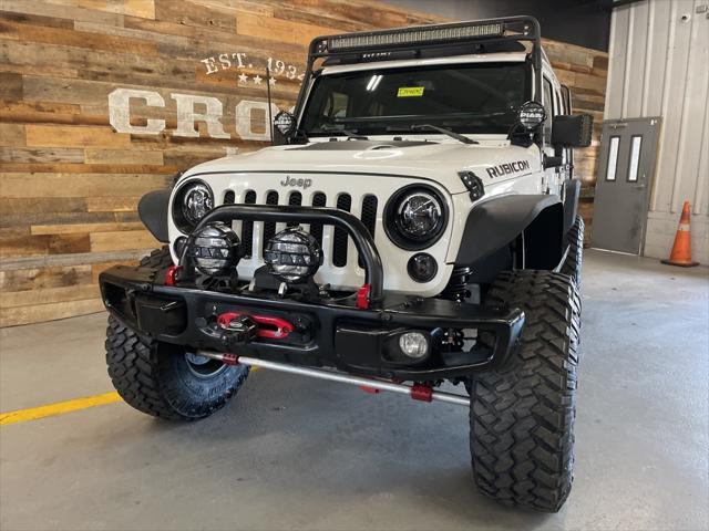 used 2015 Jeep Wrangler Unlimited car, priced at $27,780