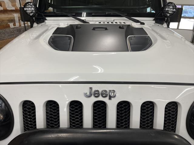 used 2015 Jeep Wrangler Unlimited car, priced at $29,106