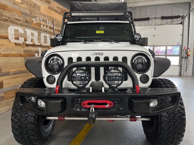 used 2015 Jeep Wrangler Unlimited car, priced at $29,106