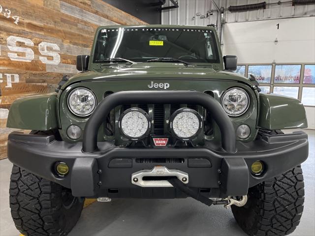 used 2014 Jeep Wrangler Unlimited car, priced at $56,000