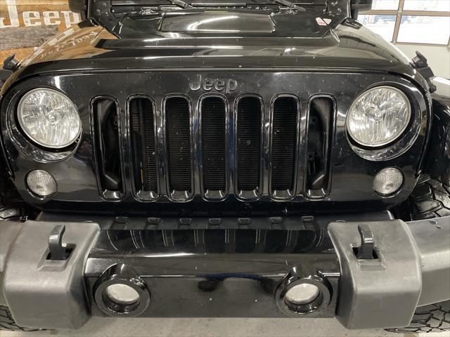 used 2015 Jeep Wrangler Unlimited car, priced at $19,596