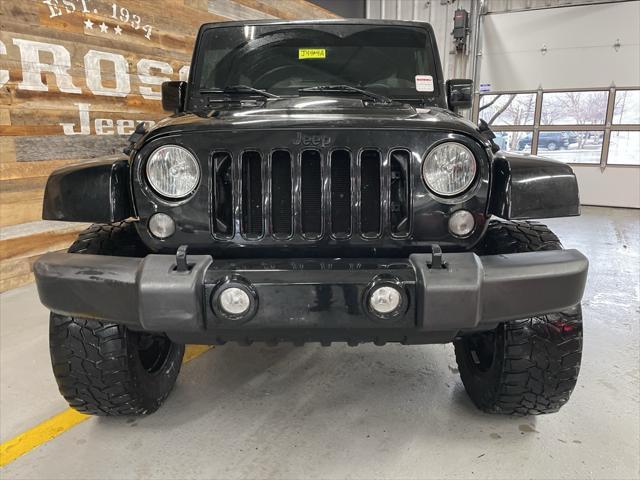 used 2015 Jeep Wrangler Unlimited car, priced at $19,596