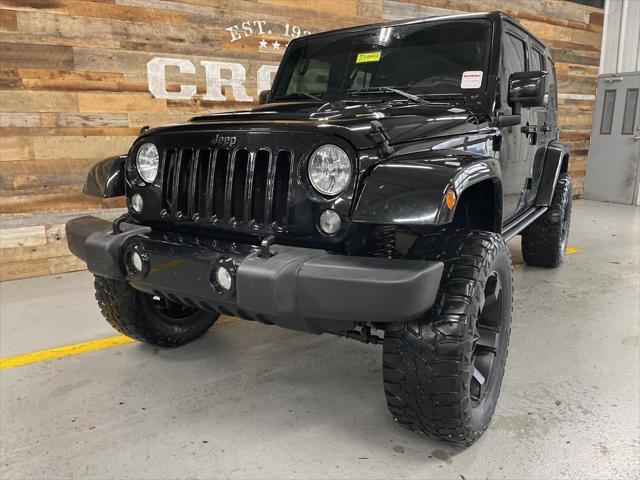 used 2015 Jeep Wrangler Unlimited car, priced at $19,596