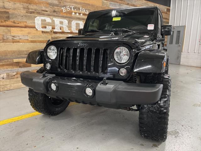 used 2015 Jeep Wrangler Unlimited car, priced at $19,596