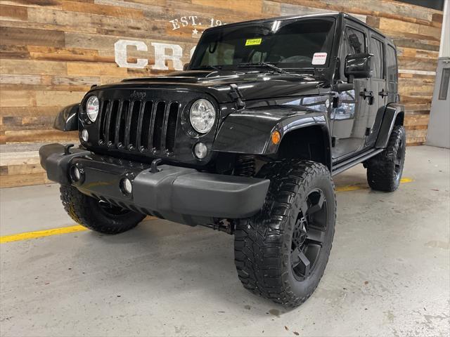 used 2015 Jeep Wrangler Unlimited car, priced at $19,596