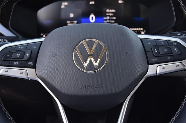 used 2024 Volkswagen Taos car, priced at $22,355