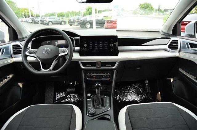new 2025 Volkswagen Taos car, priced at $32,406