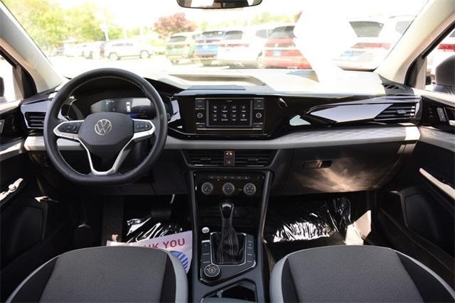 used 2024 Volkswagen Taos car, priced at $23,995